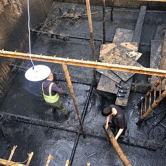 江阴市某印染厂区调节池清淤工程